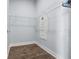 Walk-in closet with wire shelving and laminate flooring for ample storage at 4810 W Mcelroy Ave # 7, Tampa, FL 33611
