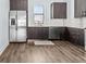 Modern kitchen with stainless steel appliances and granite countertops at 4810 W Mcelroy Ave # 7, Tampa, FL 33611