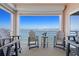 Relax on this condo balcony with comfortable seating and panoramic views of the bay at 4951 Bacopa S Ln # 801, St Petersburg, FL 33715