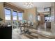 This cozy dining area features contemporary furnishings and beautiful views at 4951 Bacopa S Ln # 801, St Petersburg, FL 33715