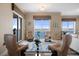 Spacious living room featuring elegant seating, serene water views, and a bright, inviting ambiance at 4951 Bacopa S Ln # 801, St Petersburg, FL 33715