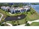 Beautiful waterfront condos featuring a pond with fountain, and golf course views at 50 Coe Rd # 223, Belleair, FL 33756