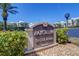 Elegant Baygreen sign at 50 Coe Road, set among tropical plants and manicured landscaping at 50 Coe Rd # 223, Belleair, FL 33756