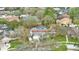 Aerial view of property highlighting the backyard pool and mature landscaping in a residential neighborhood at 503 Old Grove Dr, Lutz, FL 33548