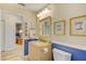 Bathroom vanity with granite countertops and view to bedroom at 503 Old Grove Dr, Lutz, FL 33548