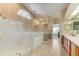 Bathroom featuring a shower, tub, double vanity with white marble countertop at 503 Old Grove Dr, Lutz, FL 33548
