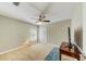 Spacious bedroom with window, ceiling fan, and closet at 503 Old Grove Dr, Lutz, FL 33548