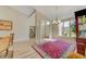 Spacious foyer with high ceilings, columns, and a decorative rug at 503 Old Grove Dr, Lutz, FL 33548