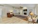 Bright living room with fireplace and vaulted ceiling at 503 Old Grove Dr, Lutz, FL 33548
