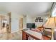 Bright office space featuring a wooden desk, leather chair, and modern decor at 503 Old Grove Dr, Lutz, FL 33548