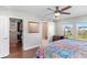 Bedroom featuring a walk-in closet and en suite bathroom at 5351 Bridge St # 41, Tampa, FL 33611