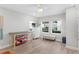 Neutral bedroom featuring wood-look floors, lots of light and simple decor at 5351 Bridge St # 41, Tampa, FL 33611