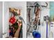 Organized closet with assorted storage solutions, including shelving, hanging racks, and bicycle mounts at 5351 Bridge St # 41, Tampa, FL 33611