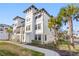 Stylish townhouses with towering palm trees and well-kept lawns for a serene setting at 5351 Bridge St # 41, Tampa, FL 33611