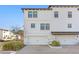 Beautiful modern townhouse with a two-car garage and well-manicured landscaping at 5351 Bridge St # 41, Tampa, FL 33611