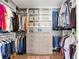 Organized walk-in closet featuring custom shelving and drawers for optimal storage in a home at 5351 Bridge St # 41, Tampa, FL 33611