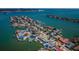 Quaint waterfront community offering a variety of homes with docks and quick access to the bay at 629 59Th Ave, St Pete Beach, FL 33706