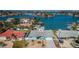 Aerial showcasing the waterfront property, lush landscaping, and desirable location at 629 59Th Ave, St Pete Beach, FL 33706