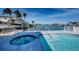 Enjoy outdoor living with a pool, spa, and waterfront view on the expansive patio at 629 59Th Ave, St Pete Beach, FL 33706