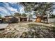 Large backyard featuring playset, storage shed, and wood deck at 6445 109Th N Ave, Pinellas Park, FL 33782