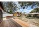 Backyard with wooden deck, hot tub, playset, partially fenced in at 6445 109Th N Ave, Pinellas Park, FL 33782