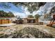 Spacious backyard featuring a playset, storage shed, and wood deck at 6445 109Th N Ave, Pinellas Park, FL 33782