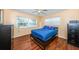 Cozy bedroom with warm wood flooring, natural light, and ample storage, creating a comfortable retreat at 6445 109Th N Ave, Pinellas Park, FL 33782