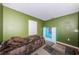 This bedroom features modern carpeting and light, offering a serene and comfortable space at 6445 109Th N Ave, Pinellas Park, FL 33782