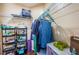 Walk-in closet includes multiple shelves, organizing rods, and ample space for efficient storage at 6445 109Th N Ave, Pinellas Park, FL 33782