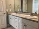 Bathroom features a double vanity with generous counter space and storage below, blending style and functionality at 6815 Dali Ave # F101, Land O Lakes, FL 34637