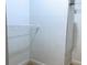 Walk-in closet with a wire shelf, ready for organizing your personal items at 6815 Dali Ave # F101, Land O Lakes, FL 34637