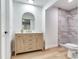 Well-lit bathroom showcases updated vanity with a walk-in shower and modern tiling at 303 Suzette Dr, Brandon, FL 33511