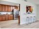 Spacious kitchen with stainless steel appliances and breakfast bar at 303 Suzette Dr, Brandon, FL 33511