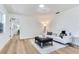 Bright living room featuring a white couch, area rug, and modern decor at 303 Suzette Dr, Brandon, FL 33511