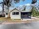 Charming single story home featuring a screened in porch and mature trees at 11201 Blendale Dr, Riverview, FL 33569