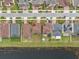 An aerial view showing backyards, fences and a pond in the neighborhood at 11544 Brighton Knoll Loop, Riverview, FL 33579