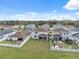 Scenic backyard featuring a lush lawn, patio, and community views from an elevated vantage point at 11544 Brighton Knoll Loop, Riverview, FL 33579