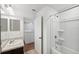 Bathroom featuring marble countertop vanity sink, toilet, showerhead, and a bathtub at 11544 Brighton Knoll Loop, Riverview, FL 33579