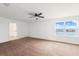 Spacious carpeted bedroom with a ceiling fan and a view of the water at 11544 Brighton Knoll Loop, Riverview, FL 33579