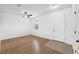 Bright, expansive foyer featuring light wood floors, a ceiling fan, and a white front door at 11544 Brighton Knoll Loop, Riverview, FL 33579