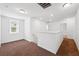 Spacious carpeted upstairs loft with a large window offering natural light at 11544 Brighton Knoll Loop, Riverview, FL 33579