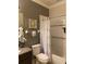 This bathroom features a tub and shower combination and a granite vanity at 11648 Palmetto Pine St, Riverview, FL 33569
