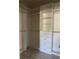 Organized walk-in closet with built-in shelving and drawers for maximum storage at 11648 Palmetto Pine St, Riverview, FL 33569