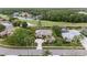 An aerial view of this lovely home with mature landscaping and serene community surroundings at 11815 Marblehead Dr, Tampa, FL 33626