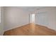 Bedroom with hardwood floors, a ceiling fan, double closet and natural light at 11815 Marblehead Dr, Tampa, FL 33626