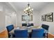 Inviting dining room featuring modern decor, hardwood floors, and stylish lighting for memorable dining experiences at 11815 Marblehead Dr, Tampa, FL 33626