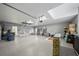 Spacious garage with epoxy floors and ample storage space at 11815 Marblehead Dr, Tampa, FL 33626