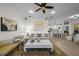 Open-concept living room featuring elegant decor and seamless flow to the kitchen and dining area at 11815 Marblehead Dr, Tampa, FL 33626
