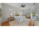 Serene main bedroom with a plush rug, comfortable bed, and pool access at 11815 Marblehead Dr, Tampa, FL 33626