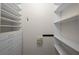 Organized walk-in closet with shelving and drawer units for optimal storage at 11815 Marblehead Dr, Tampa, FL 33626